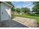 Spacious backyard featuring a wooden deck and a storage shed at 330 Central Ave, Kannapolis, NC 28081