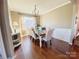 Elegant dining room with hardwood floors and stylish chandelier at 3416 Yarmouth Ln, Gastonia, NC 28056