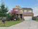 Charming brick home with a well-manicured lawn and beautiful landscaping at 3416 Yarmouth Ln, Gastonia, NC 28056
