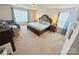 Relaxing and spacious bedroom with large windows and comfortable furniture at 3416 Yarmouth Ln, Gastonia, NC 28056