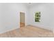 Bright bedroom with hardwood floors, neutral paint, and one window for natural light at 364 Luther Dr, Iron Station, NC 28080