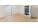 Spacious bonus room with wood floors and a doorway to the garage at 364 Luther Dr, Iron Station, NC 28080