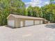 Gigantic garage with multiple bay doors for all your toys! at 364 Luther Dr, Iron Station, NC 28080
