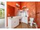 Primary bathroom has a separate vanity, large mirror, and toilet at 3917 Erskine Woods Dr, Bessemer City, NC 28016