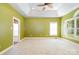 Spacious bedroom with trey ceiling, neutral carpet, and ample natural light at 3917 Erskine Woods Dr, Bessemer City, NC 28016
