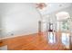Spacious living room with high ceilings, hardwood floors, and ample natural light at 3917 Erskine Woods Dr, Bessemer City, NC 28016