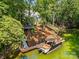 Waterfront property with private boat dock and lift, offering easy access to recreational boating at 402 Wildlife Rd, Troutman, NC 28166