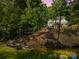 Scenic waterfront home with private dock offering serene views and direct lake access at 402 Wildlife Rd, Troutman, NC 28166