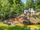 Scenic waterfront home with private dock offering serene views and direct lake access at 402 Wildlife Rd, Troutman, NC 28166