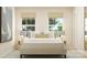 Peaceful bedroom featuring a bed with a neutral-toned headboard, ambient lighting, and a contemporary art piece at 4247 Skyboat Cir, Fort Mill, SC 29715