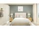Inviting bedroom with a neatly made bed, complemented by bedside lamps and a soothing color palette at 4247 Skyboat Cir, Fort Mill, SC 29715