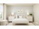 Serene bedroom with a plush bed, matching nightstands, and soft lighting creating a tranquil atmosphere at 4247 Skyboat Cir, Fort Mill, SC 29715