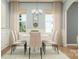 Elegant dining room with a modern chandelier, large windows, and stylish decor, ideal for entertaining at 4247 Skyboat Cir, Fort Mill, SC 29715