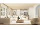 Spacious living room featuring modern decor, hardwood floors, and an open layout connecting to the kitchen and dining area at 4247 Skyboat Cir, Fort Mill, SC 29715