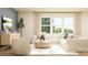 Bright living room showcasing a modern white sectional sofa and an elegant round wooden coffee table at 4247 Skyboat Cir, Fort Mill, SC 29715