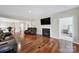 This living room has hardwood floors, a fireplace, and a leather recliner at 45008 Wigeon Ln # 202, Indian Land, SC 29707