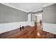 Spacious office featuring hardwood floors, elegant trim, and a doorway view to other rooms at 45008 Wigeon Ln # 202, Indian Land, SC 29707
