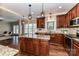 Spacious kitchen with granite island, stainless appliances, and ample counter space at 4637 Shannamara Dr, Matthews, NC 28104