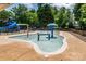 Fun splash pad with various water features offers a safe and refreshing play area for children of all ages at 4637 Shannamara Dr, Matthews, NC 28104