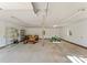 Inside the garage, featuring ample space for storage or projects, with great lighting and a large open floor at 5170 Woodleaf Rd, Salisbury, NC 28147