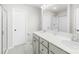 Bathroom with dual sink vanity and a glass enclosed shower at 5204 Belstone Ln, Charlotte, NC 28215