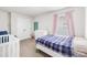 Bedroom with a crib and comfortable bed, perfect for a Bedroom at 5204 Belstone Ln, Charlotte, NC 28215
