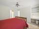 Bedroom featuring built-in desk, closet, and neutral carpet at 550 Burrage Ne Rd, Concord, NC 28025