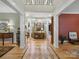 Grand foyer with wood floors and an open view to the living room at 550 Burrage Ne Rd, Concord, NC 28025