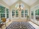 Charming sun room with large windows, hardwood floors and natural light at 550 Burrage Ne Rd, Concord, NC 28025