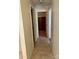 Tiled hallway leading to rooms, providing easy access to various parts of the house at 6000 Amberly Ln, Charlotte, NC 28213