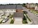 An aerial view of a townhouse complex shows the neighborhood street at 6309 Margaret Ct, Indian Trail, NC 28079
