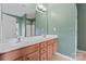Bathroom features a double sink vanity with granite countertop and a large mirror at 6309 Margaret Ct, Indian Trail, NC 28079