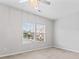 This bedroom has bright sunlight and two windows overlooking the neighborhood at 6309 Margaret Ct, Indian Trail, NC 28079