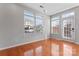 Spacious living room with hardwood floors, large windows, and natural light at 6309 Margaret Ct, Indian Trail, NC 28079
