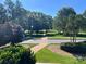 Picturesque street view showcasing well-manicured lawns, mature trees, and inviting brick walkways at 6309 Margaret Ct, Indian Trail, NC 28079