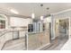 Well-appointed kitchen with stainless steel appliances, granite countertops, island, and ample cabinet space at 6419 Antioch Ct, Matthews, NC 28104