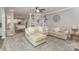 Spacious open-concept living room featuring neutral decor and a seamless flow into the kitchen and dining area at 6419 Antioch Ct, Matthews, NC 28104