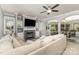 Bright living room with fireplace, built-in shelving, bay window, and comfortable seating at 6419 Antioch Ct, Matthews, NC 28104