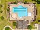 An aerial view of a community pool featuring lounge chairs, tables, and landscaping at 645 Brookhaven Dr, Fort Mill, SC 29708
