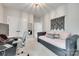 Neutral toned bedroom with a daybed, macrame wall art, and carpeted flooring at 645 Brookhaven Dr, Fort Mill, SC 29708