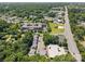 Picturesque aerial view showcasing a residential area, surrounded by trees, and a nearby highway at 740 Tavern Ct # 7, Rock Hill, SC 29732