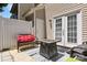 Outdoor patio with a fire pit, seating, and access to the house through French doors at 740 Tavern Ct # 7, Rock Hill, SC 29732