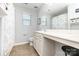 Bright bathroom with a tiled floor, shower and window at 7414 Meridale Forest Dr, Charlotte, NC 28269
