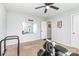 Bedroom with home gym equipment, creating a functional space for fitness and relaxation at 7414 Meridale Forest Dr, Charlotte, NC 28269