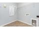 Clean laundry room featuring a foldable drying rack at 7414 Meridale Forest Dr, Charlotte, NC 28269