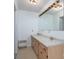 Well-lit bathroom featuring a double sink vanity and large mirror at 7660 Bud Davis Rd, Vale, NC 28168