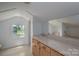 Bathroom featuring a vanity with drawers, toilet, and a bathtub shower combination at 7660 Bud Davis Rd, Vale, NC 28168