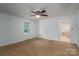 Bright bedroom boasts carpeted floor and lots of natural light at 7660 Bud Davis Rd, Vale, NC 28168