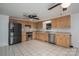 Bright eat-in kitchen boasts tile floors, wood cabinets and stainless steel appliances at 7660 Bud Davis Rd, Vale, NC 28168
