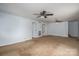 The interior of this home has carpet, multiple ceiling fans, and access to multiple rooms at 7660 Bud Davis Rd, Vale, NC 28168